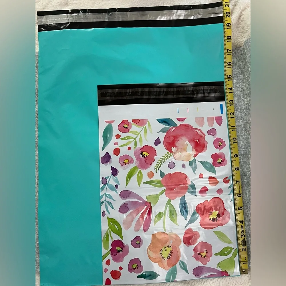 Floral & Teal Poly Mailers 10 each-20 total.Floral is 10”x13” Teal is 19”x 14.75